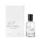 Eleganter 50 ml Glasflakon und weiße Strukturverpackung des Santelle Eau de Parfum.