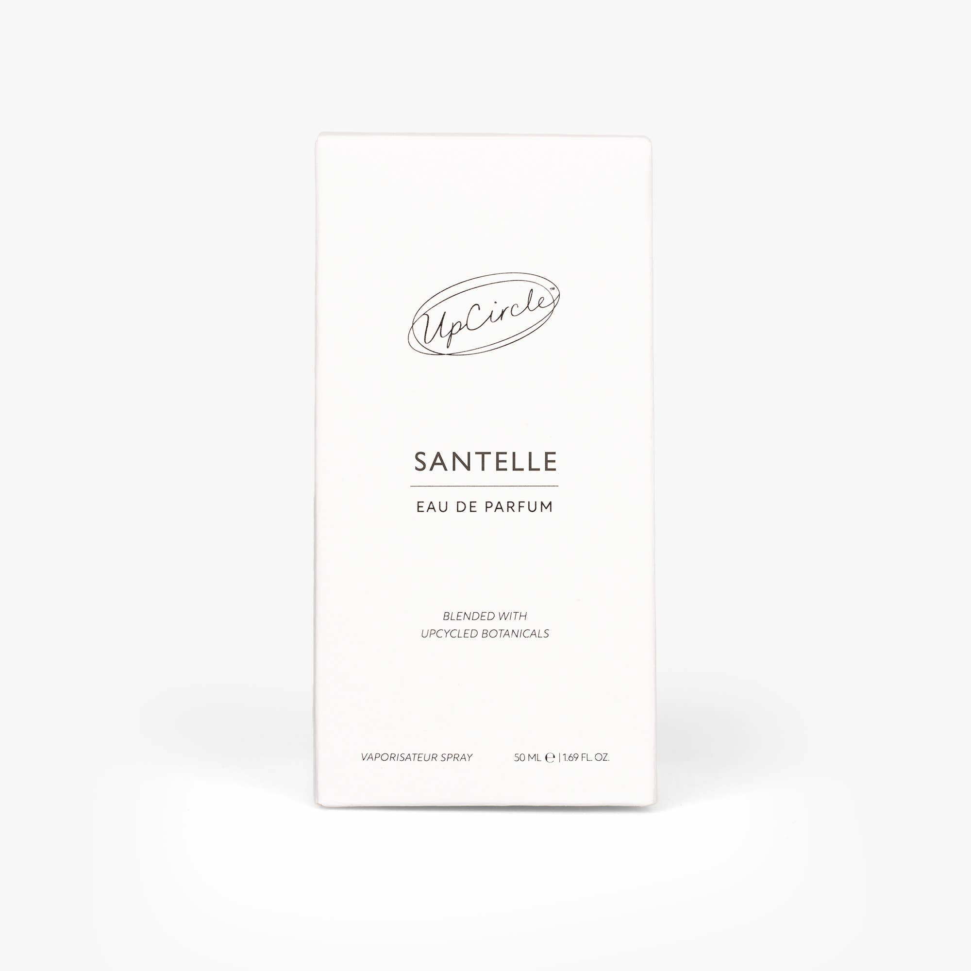 Eleganter 50 ml Glasflakon und weiße Strukturverpackung des Santelle Eau de Parfum.