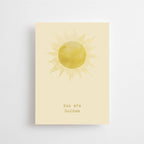 Postkarte „You are Golden“ im DIN-A6-Format mit einer gelben Aquarell-Sonne und dem Schriftzug „You are Golden“ auf hellem Hintergrund.