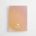 Postkarte „You are Here to Shine“ im DIN-A6-Format mit einem Farbverlauf in warmen Tönen, einer kleinen Sonne und dem Schriftzug vor hellem Hintergrund.