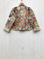 Wendbare gesteppte Patchwork Jacke aus Baumwolle Beige